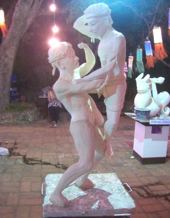 Stucco sculpture of muay Thai fighters in Thailand